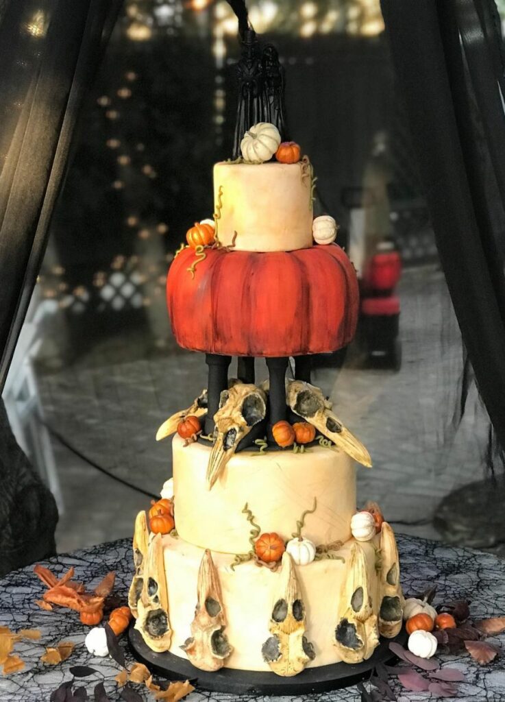 Halloween cake with raven skull and cake topper