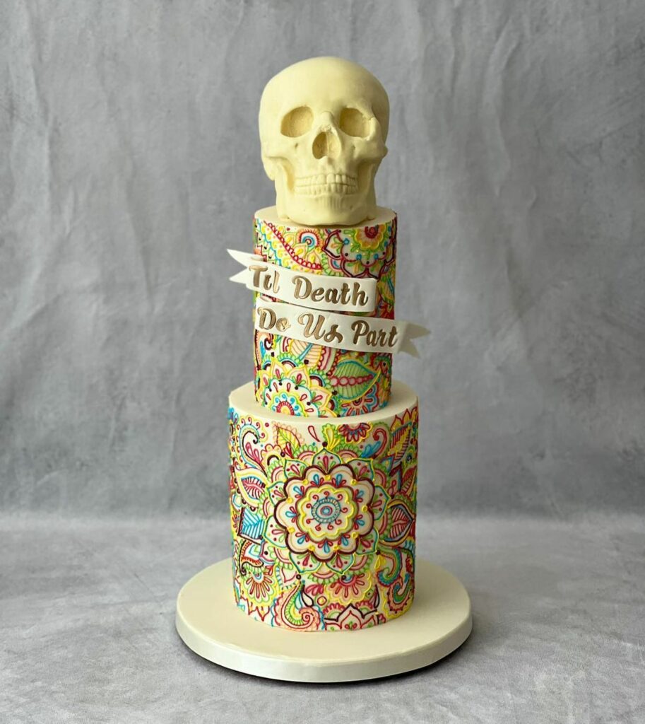 Halloween colorful wedding cake with skull
