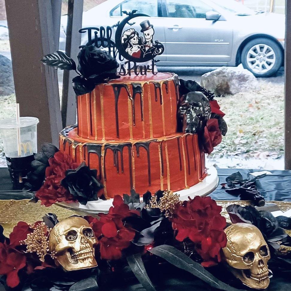 Halloween themed till death do us part wedding cake