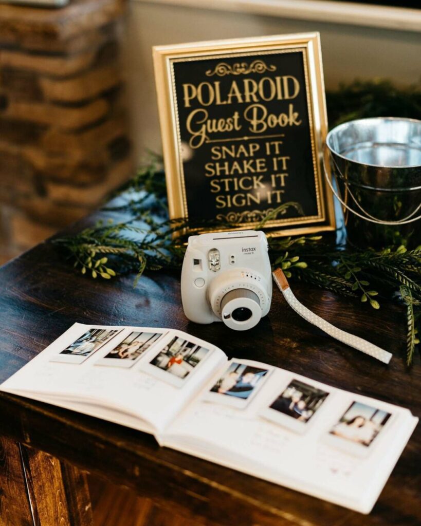 Polaroid photo booth with wedding guest book