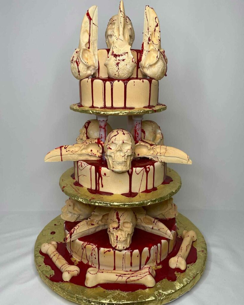 Yummy Halloween skulls golden wedding cake