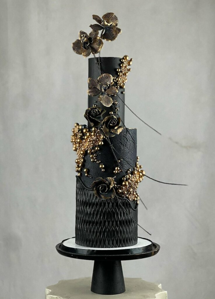 black and gold touches gothic sugar flower wedding cake