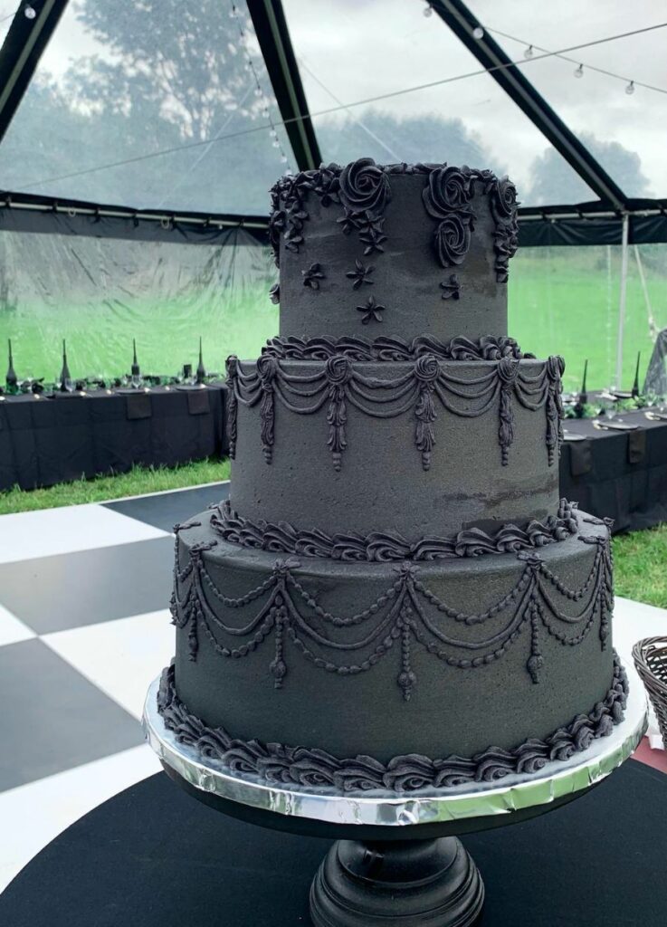 black goth wedding buttercream cake