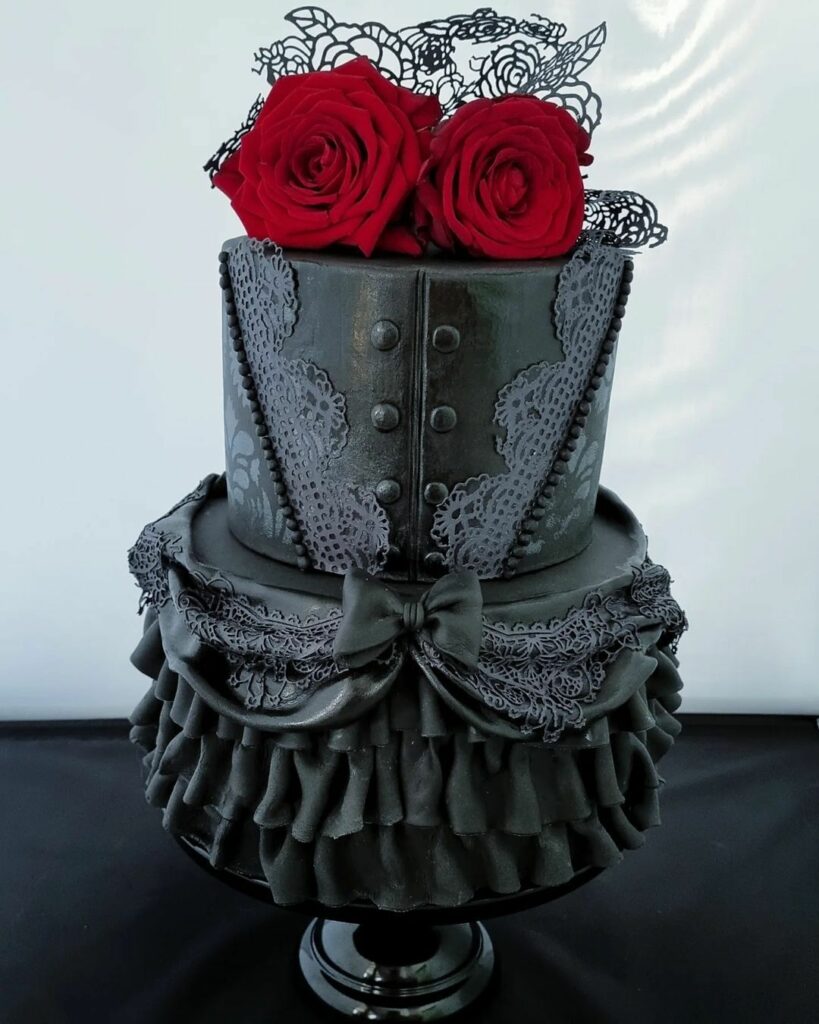 elegant Victorian inspired gothic wedding cake with moody flowers