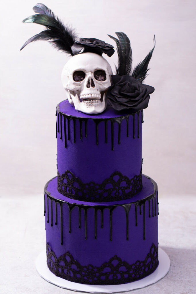 gothic purple and white skull wedding cake
