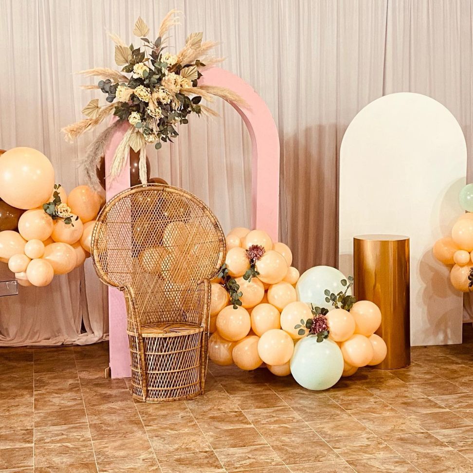 Pampas grass and balloon boho themed wedding photo booth ideas