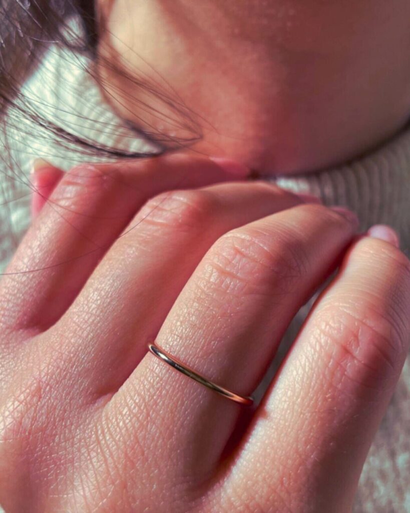 simple and thin Meghan Markle inspired gold wedding band