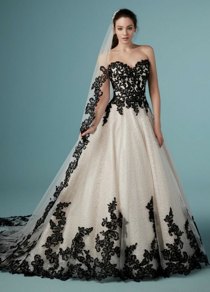 tulle and lace accented black and white ballgown with sweetheart neckline