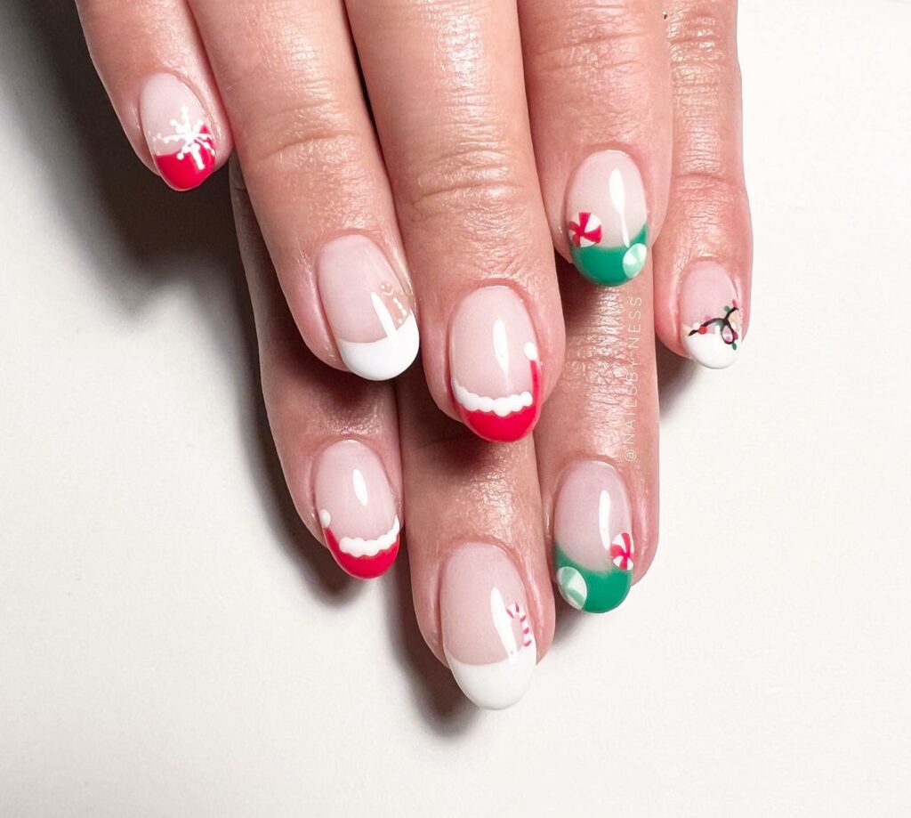 Christmas nails with Saint Nicks iconic red and white outfit accented with hints of green and festive details
