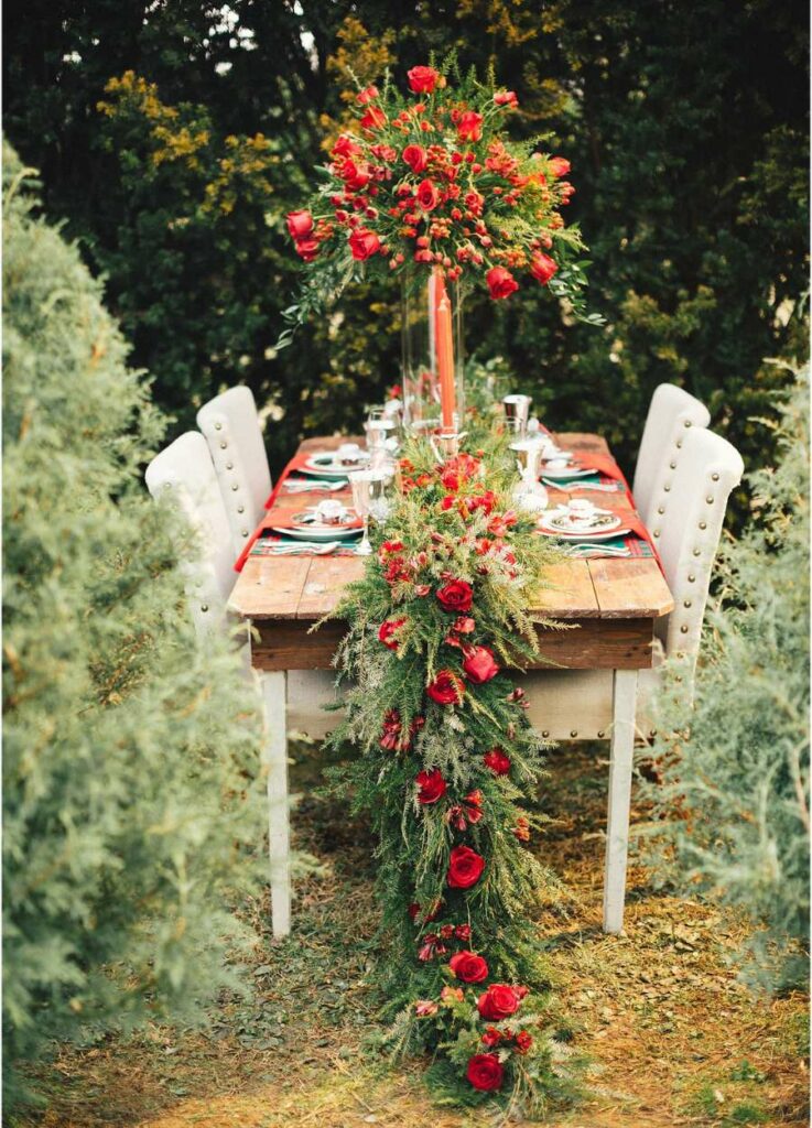 Crimson cascade floral Christmas wedding centerpiece