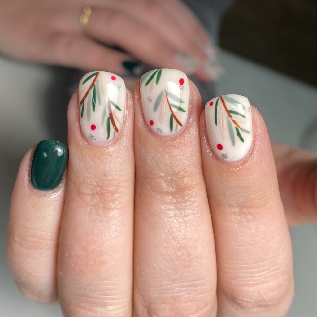 Evergreen sprigs and berries festive nail art