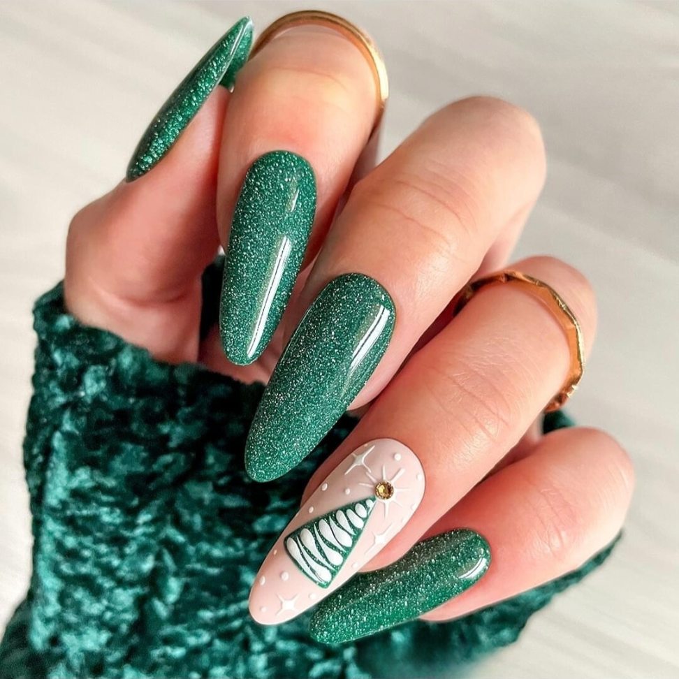 Glistening green Christmas nails with festive accent