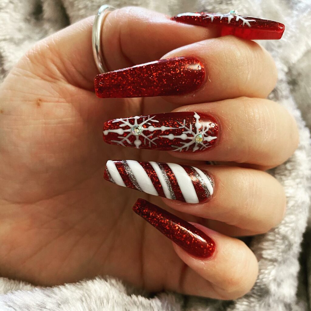 Glittering garnet Christmas winter wonderland nails
