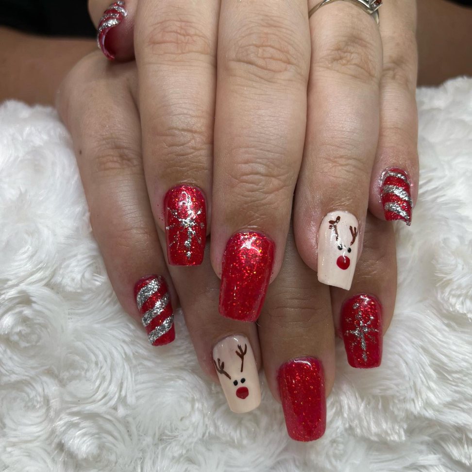 Glittering red reindeer Christmas nail art