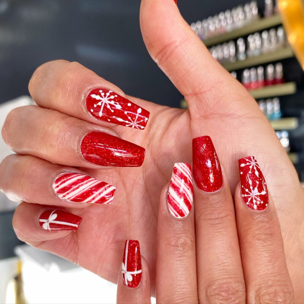 Holly jolly red and white patterns Christmas nails with snowflakes and stripes