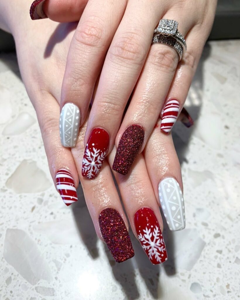 Red and crisp white pattern and snowflakes Christmas nails with glitter