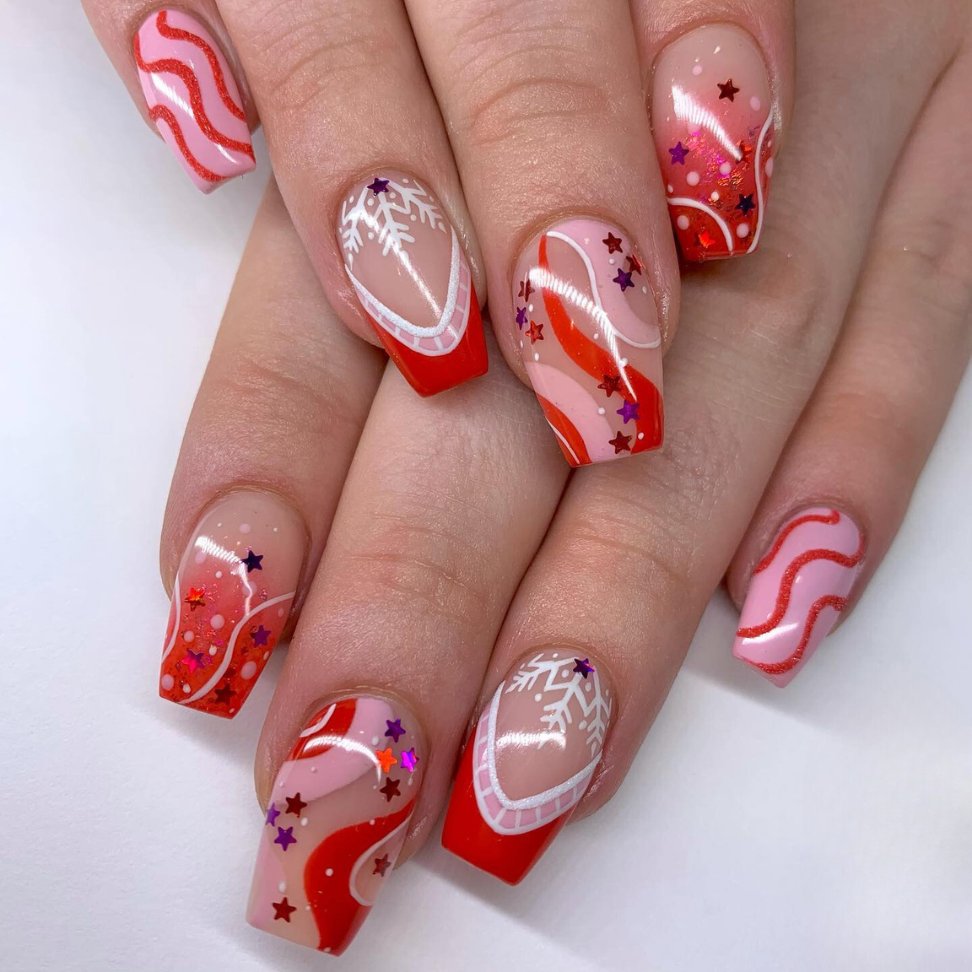 Red and transparent Christmas nail art with stars
