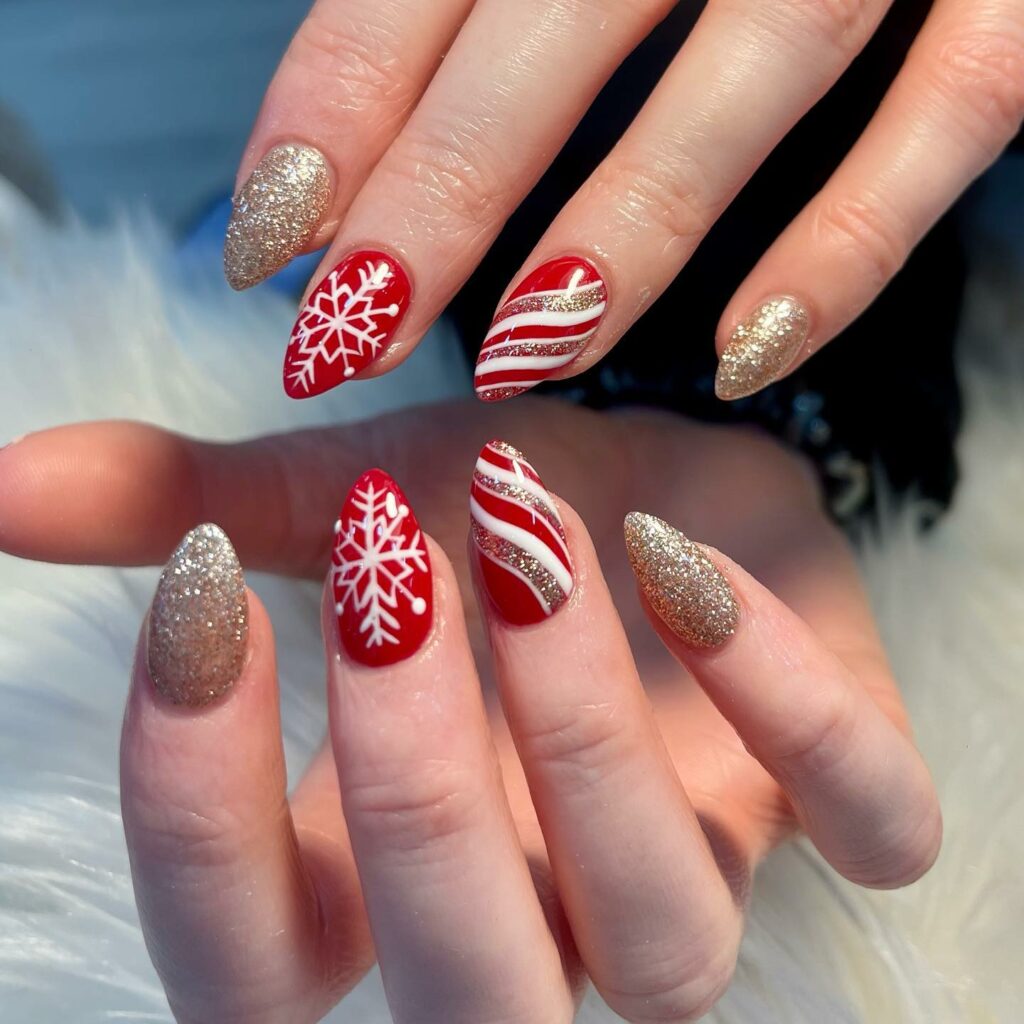 Sparkling champagne and classic red snowflake holiday nails