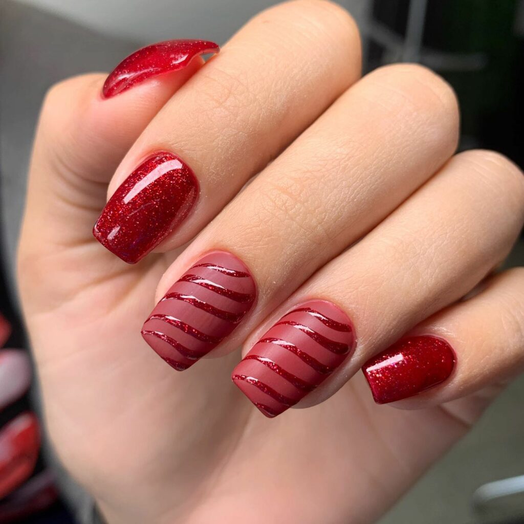 Striped crimson sparkle Christmas nail art