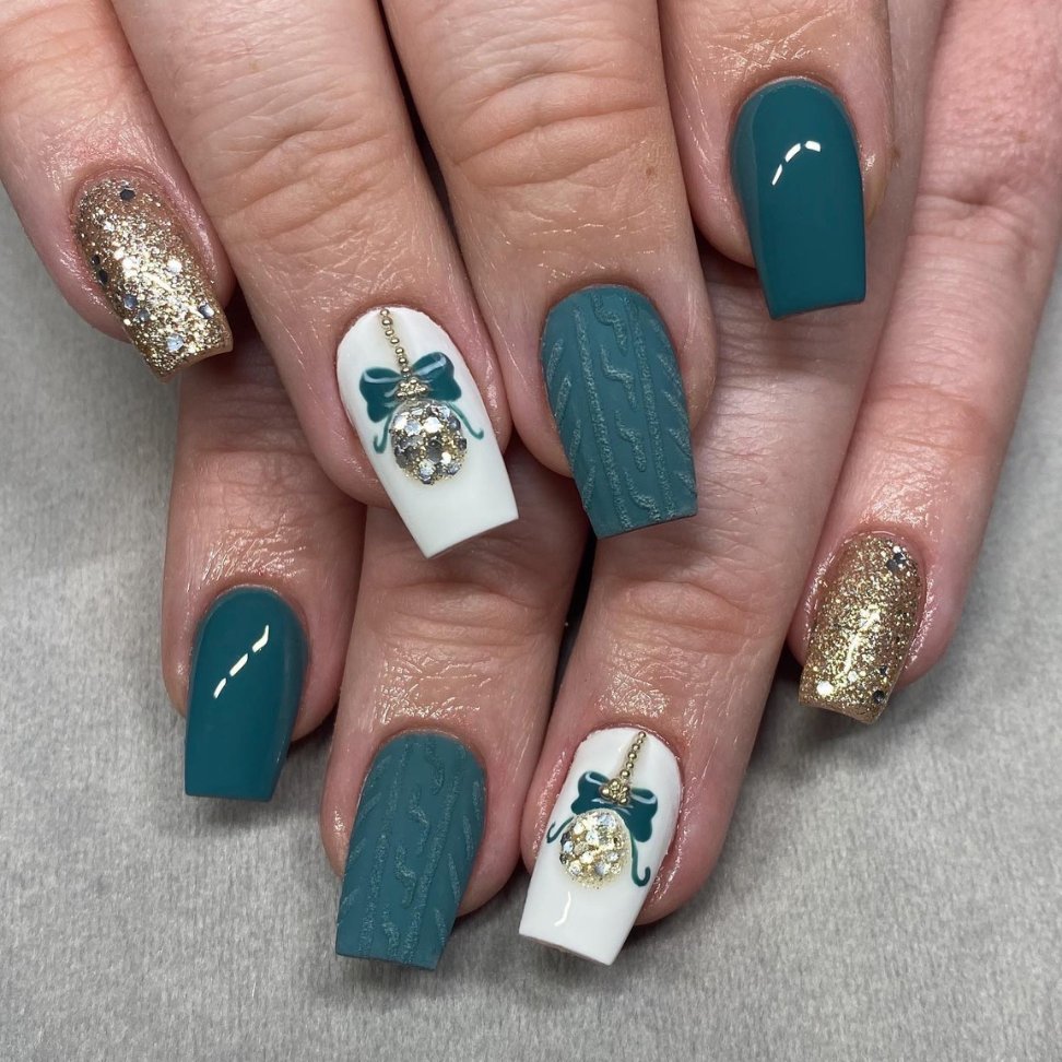 Teal treasure with golden glitz and ornament accents Christmas nail art