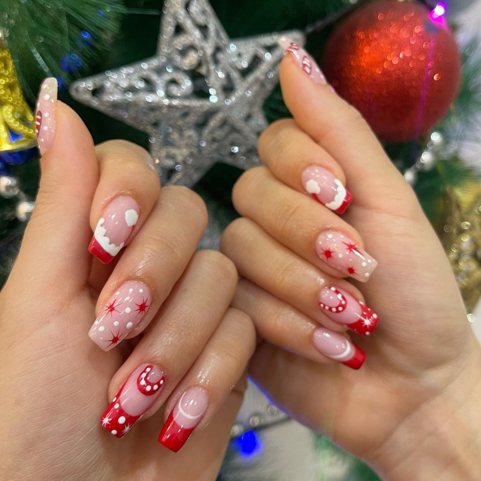 Tinsel town festive red and white Christmas nails designs