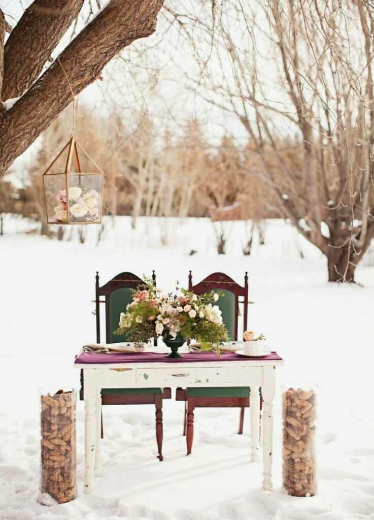 Winter whisper wedding tablescapes with rustic outdoor setting