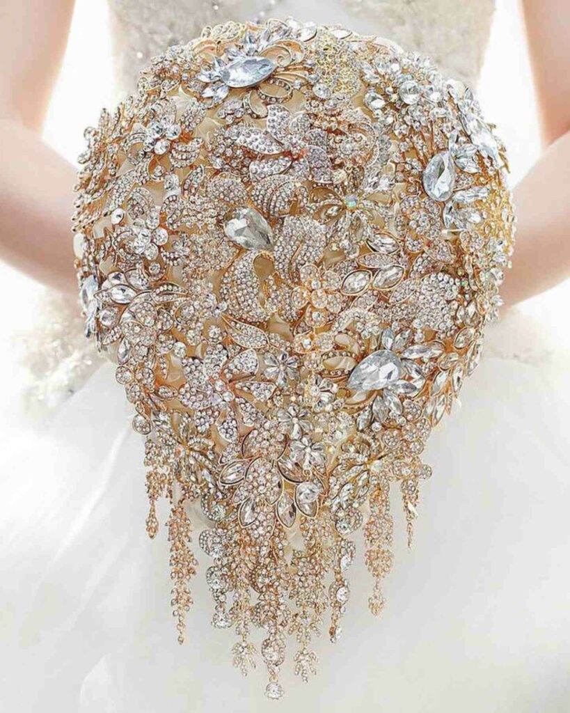 beautiful pearl and crystal cascading golden brooch wedding bouquet