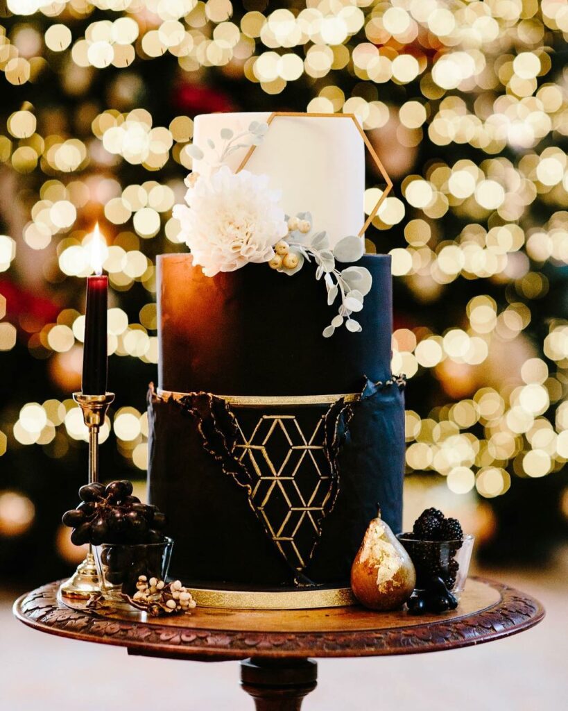 black and white winter wedding cake with gold touch