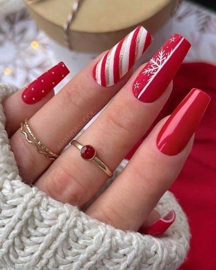 cozy and chic striped red Christmas nails