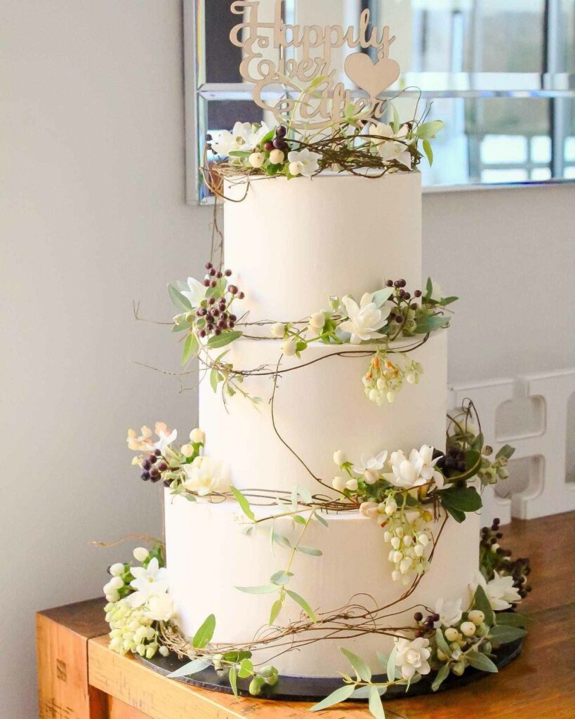 floral adorned winter garden theme wedding cake