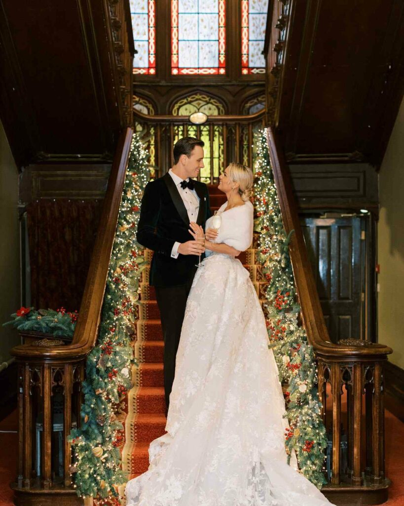 off shoulder Christmas wedding gown with festive decor