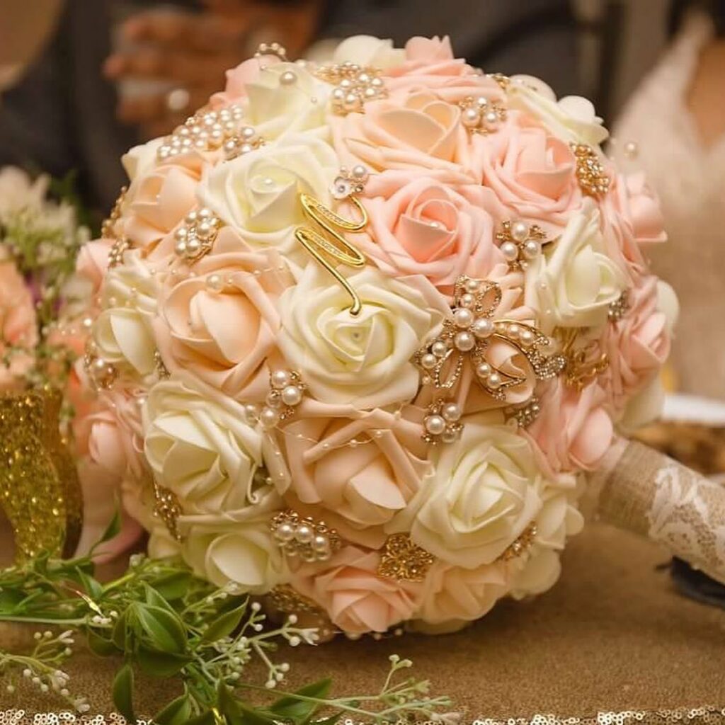 pink and golden theme brooch wedding bouquet