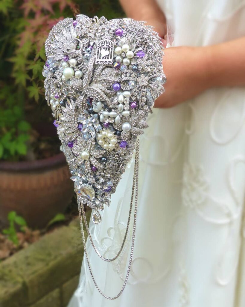 purple and white heart brooch wedding bouquet