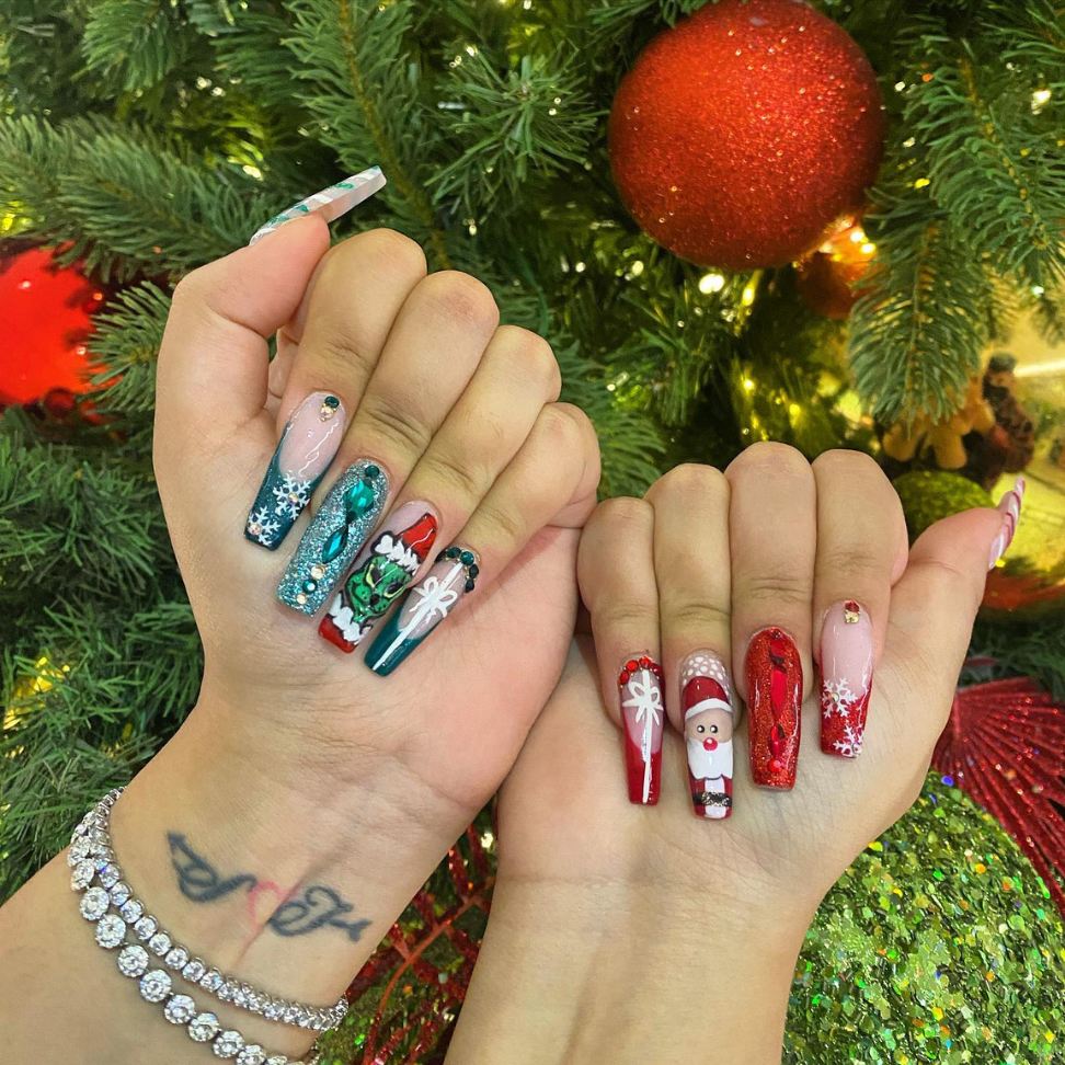 red and green with charming Christmas motifs and Santa nails art