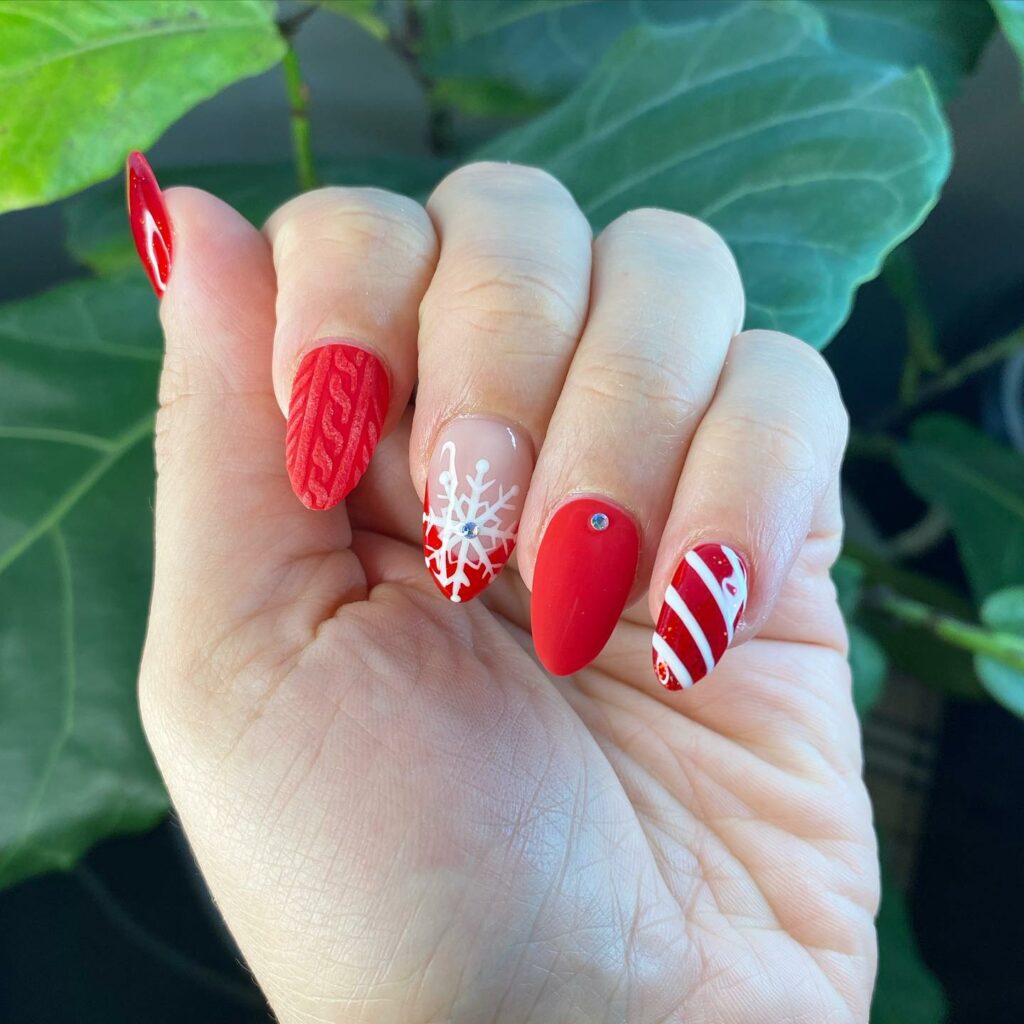 red and white candy cane Christmas nail paint