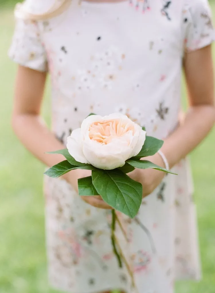 single stem small peach wedding bouquet