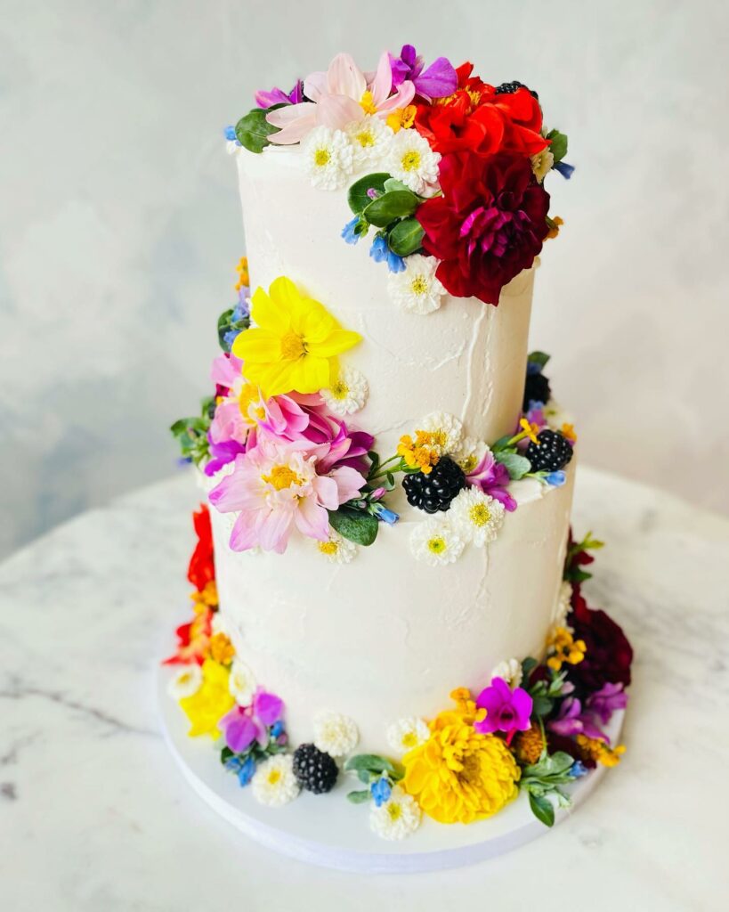 vibrant floral winter wedding cake