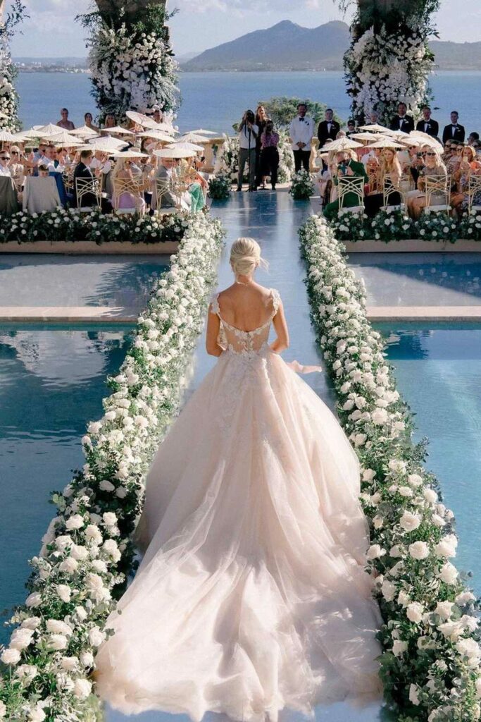 A fairytale beginning on the floral wedding aisle