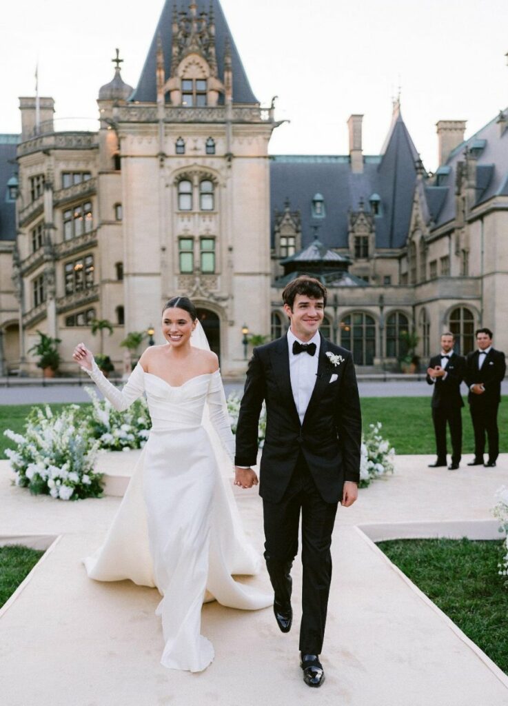 Happy newlyweds at the Biltmore Estate in Asheville North Carolina a picturesque mountain wedding venue