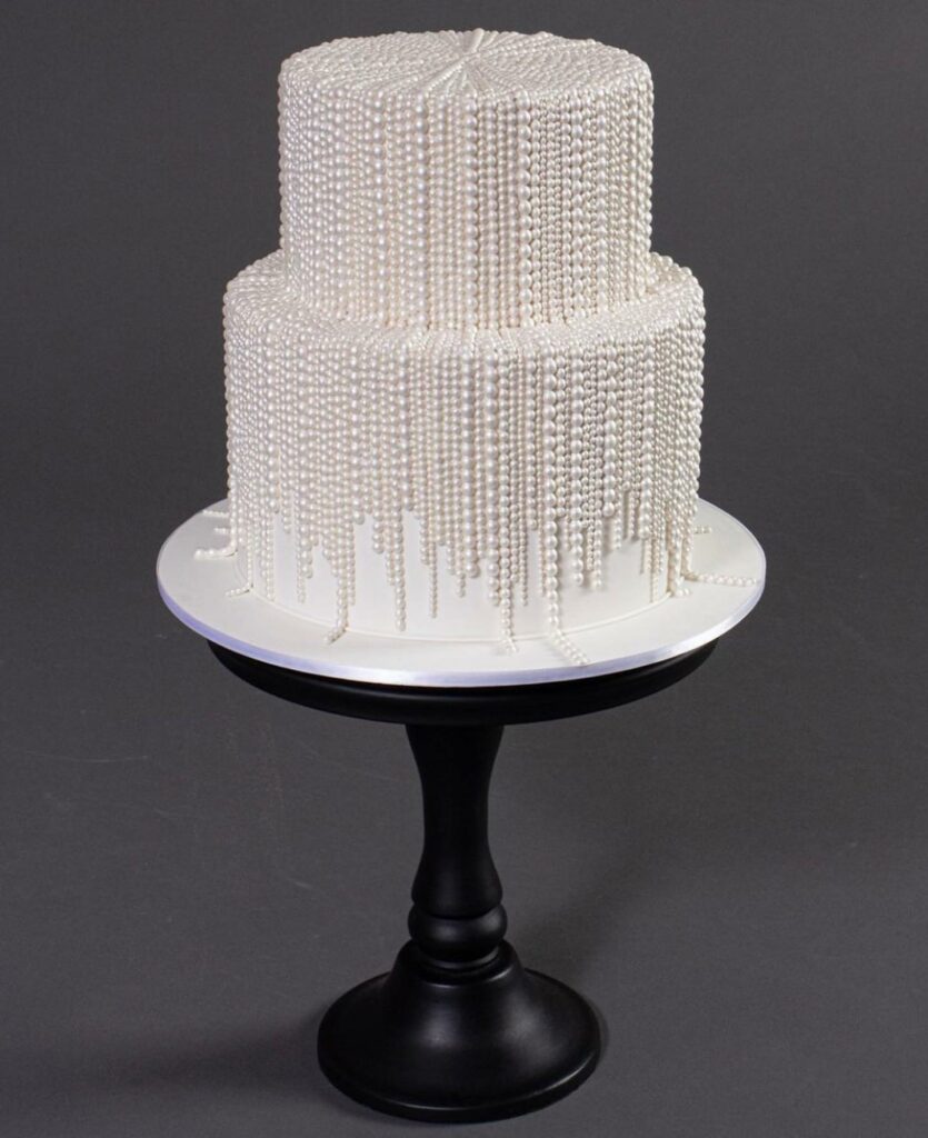 Pearl wedding cake with dramatic Pearl embellishments