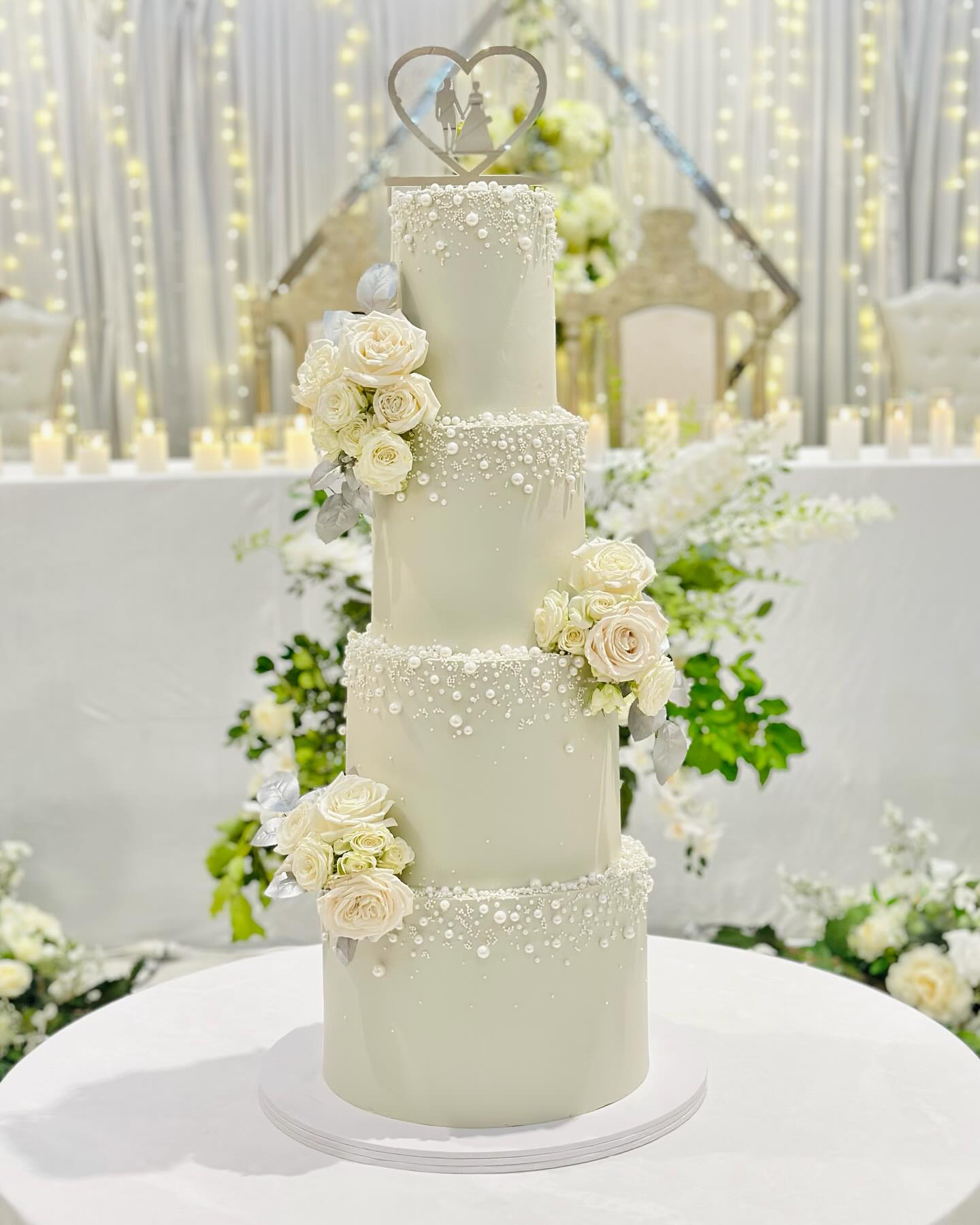 edible pearl four tiered elegant wedding cake