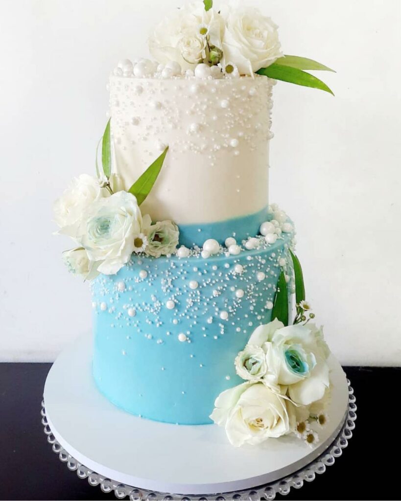 elegant blue and white pearl theme wedding cake