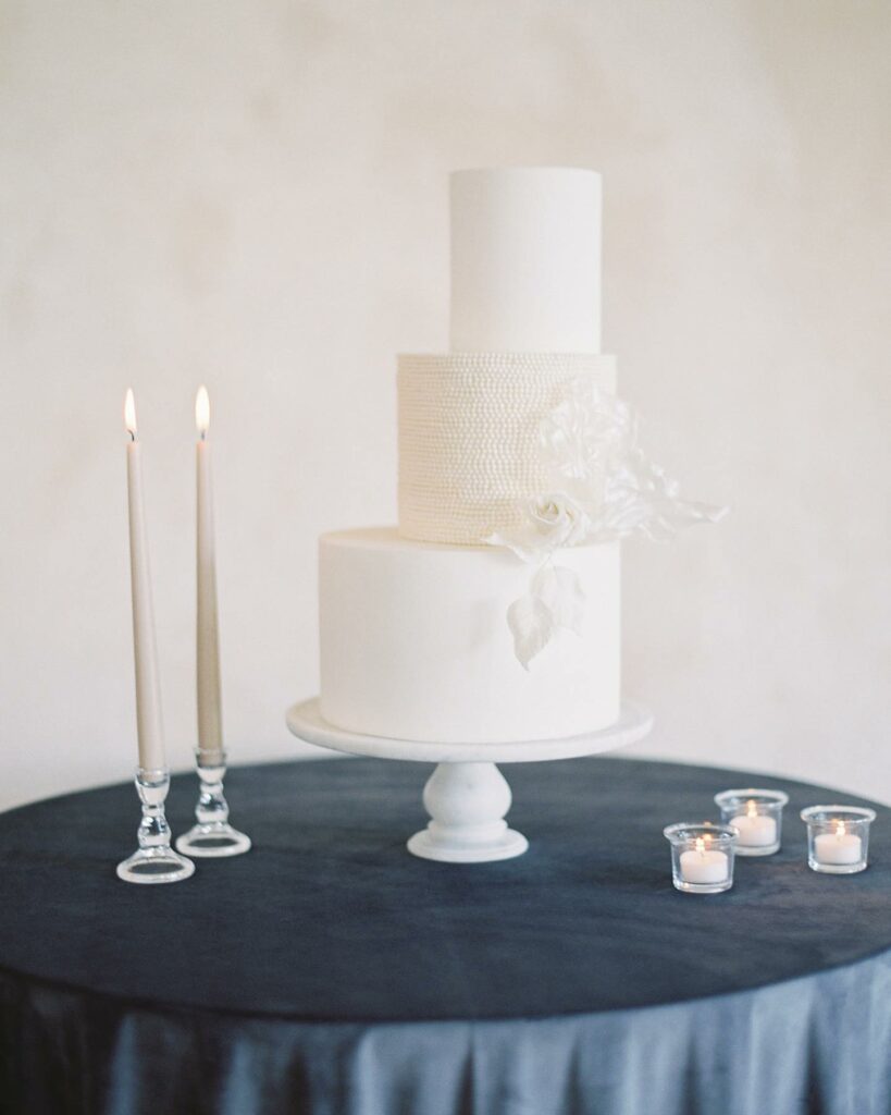 minimal pearl intricate white wedding cake