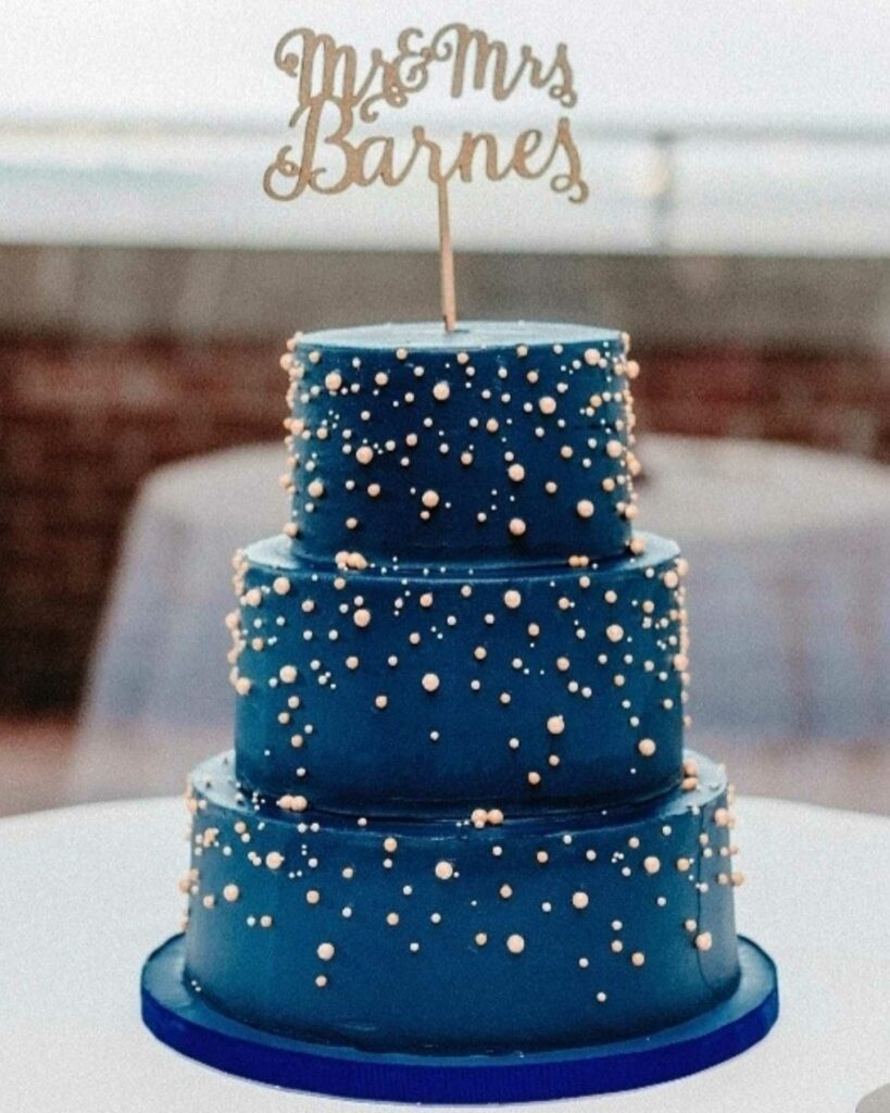 navy blue and gold pearl winter wedding cake