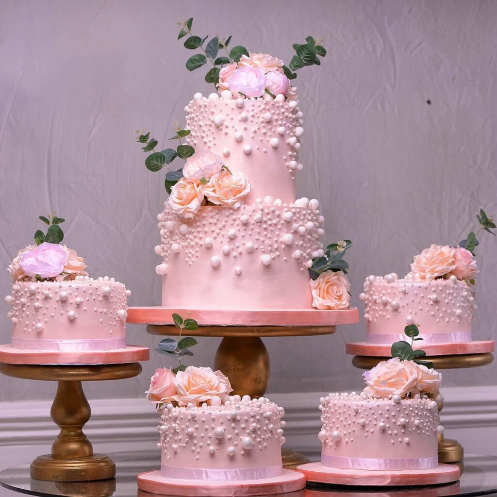 peachy blush and pearl edition wedding cake
