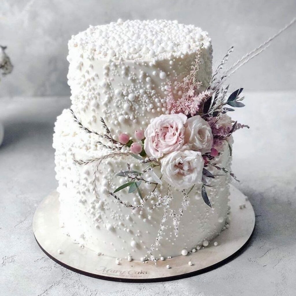 pearl inspired soft blooms wedding cake