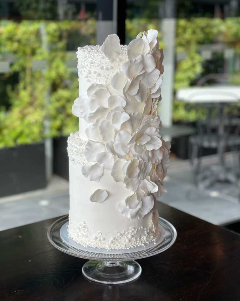 pearl with cascading of petals wedding cake