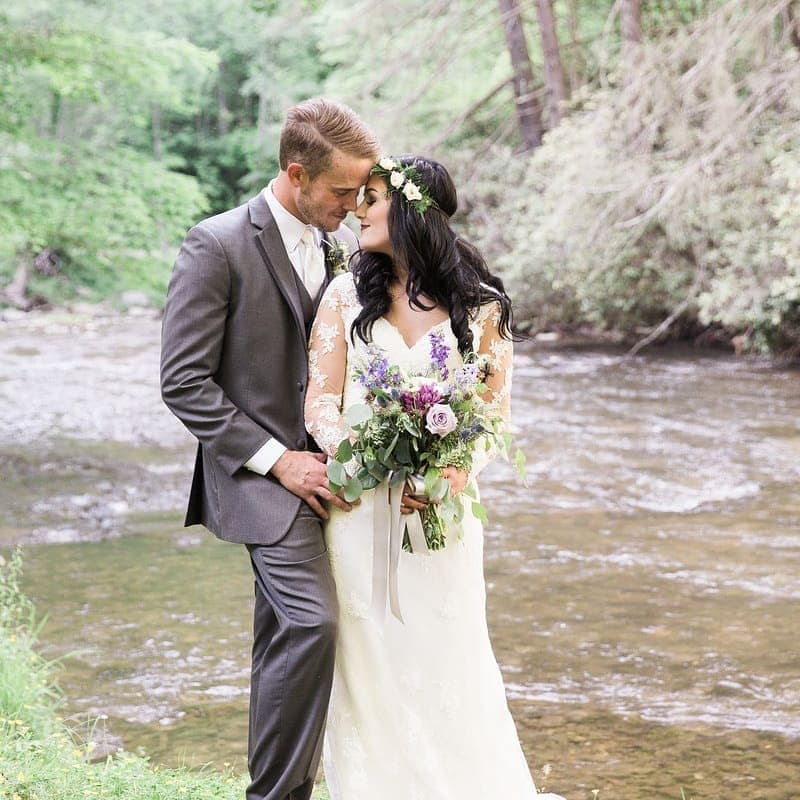 picturesque setting for a wedding where water water meets the mountains