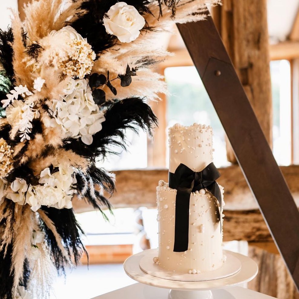 simple white and black bow pearl boho chic wedding cake