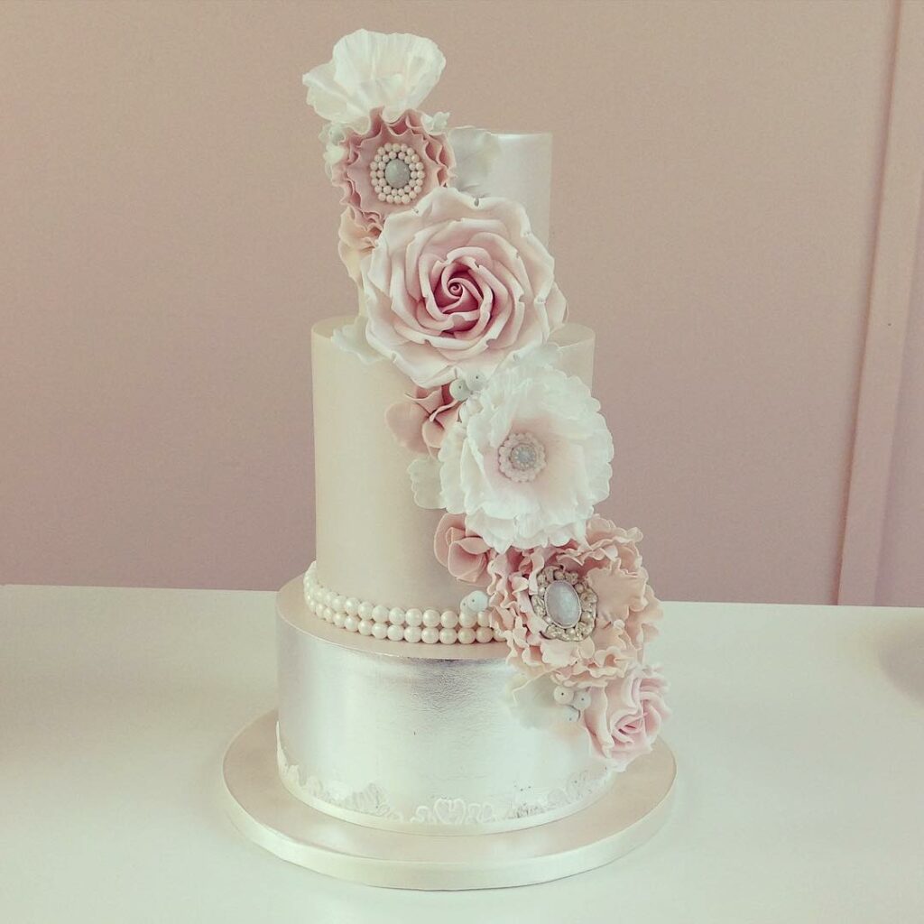 three tier silver and blush pearl wedding cake